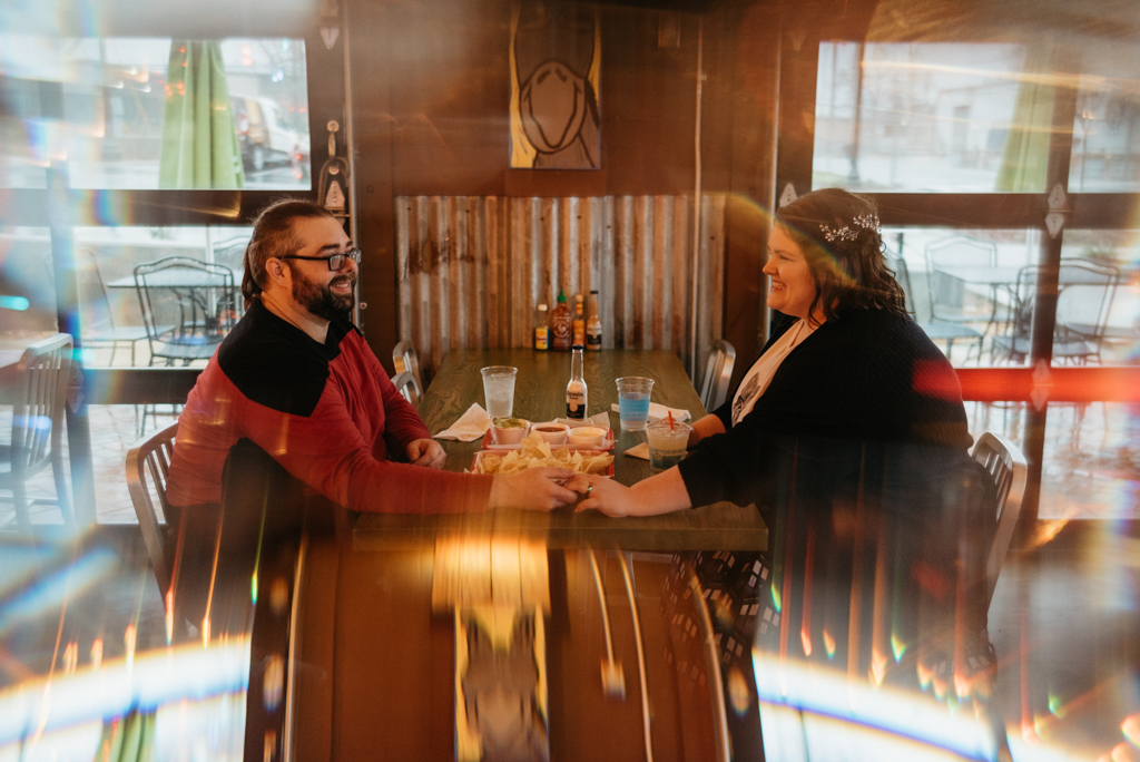 Couple smiling at mexican restaurant table