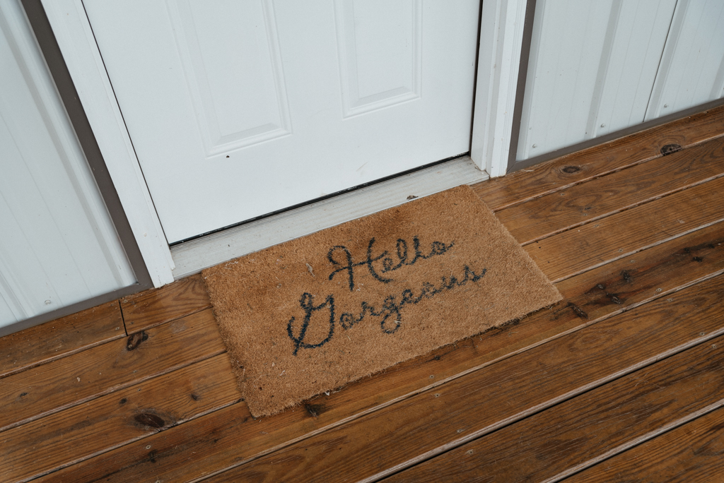 Door mat on ground